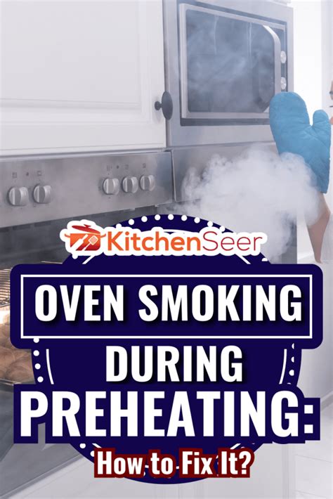 why is my gas oven smoking while preheating